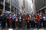 WABE: Hundreds of protesters march on Wall Street (